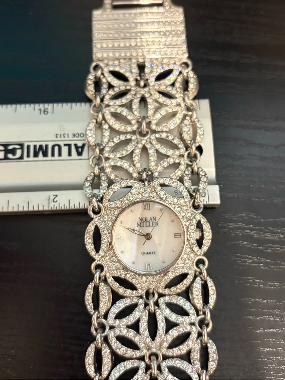 nolan miller watch stunning  silver tone rhinestone floral 7.5” needs battery